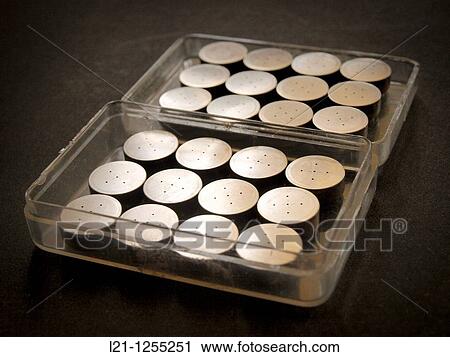 Button batteries in a plastic box for recycling View Large Photo Image Stock Image - Button batteries in a plastic box for recycling. Fotosearch
