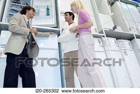 Buying a refrigerator View Large Photo Image Stock Image - Buying a refrigerator. Fotosearch