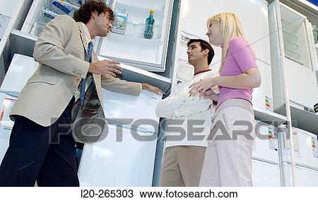 Buying a refrigerator View Large Photo Image Stock Image - Buying a refrigerator. Fotosearch