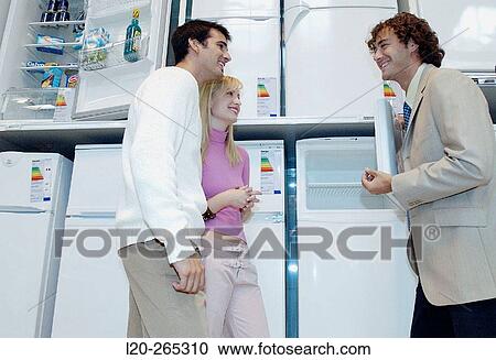 Stock Image - Buying a refrigerator. Fotosearch