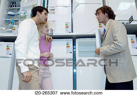 Buying a refrigerator View Large Photo Image Stock Photo - Buying a refrigerator. Fotosearch