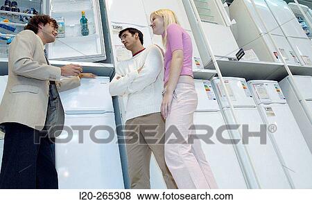 Buying a refrigerator View Large Photo Image Stock Photo - Buying a refrigerator. Fotosearch