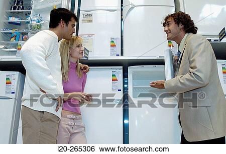 Buying a refrigerator View Large Photo Image Stock Photograph - Buying a refrigerator. Fotosearch