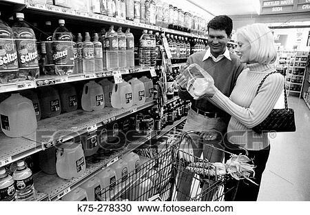 Buying drinking water View Large Photo Image Stock Image - Buying drinking water. Fotosearch
