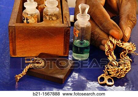 Buying old gold jewels in a jewellery, Dakar, Senegal View Large Photo Image Stock Photo - Buying old gold jewels in a jewellery, Dakar, Senegal. Fotosearch