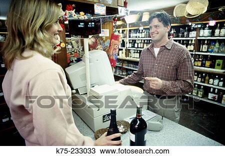 Buying wine View Large Photo Image Stock Image - Buying wine. Fotosearch