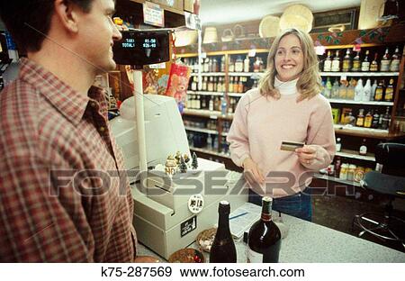 Stock Photo - buying wine. Fotosearch