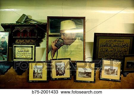 Cabinet with old photos of Morocco and a portrait of the late King Hassan II of Morocco. View Large Photo Image Stock Image - Cabinet with old photos of Morocco and a portrait of the late King Hassan II of Morocco.. Fotosearch