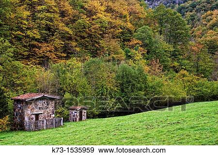 Cabins. Route of El Alba. Redes Natural Park and Biosphere Reserve. Soto de Agues. Sobrescobio Council. Asturias. Spain. View Large Photo Image Stock Photo - Cabins. Route of El Alba. Redes Natural Park and Biosphere Reserve. Soto de Agues. Sobrescobio Council. Asturias. Spain.. Fotosearch