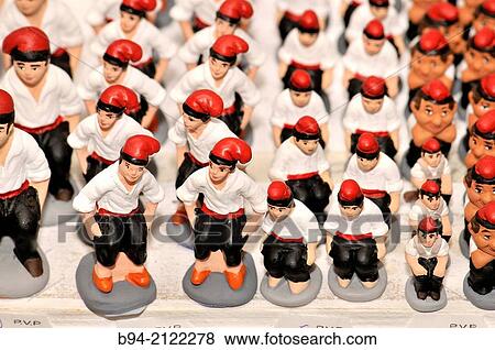 ? Caganers?, particular feature of modern nativity scenes at Santa Llucia Christmas fair, Barcelona. Catalonia, Spain. View Large Photo Image Stock Photo - ? Caganers?, particular feature of modern nativity scenes at Santa Llucia Christmas fair, Barcelona. Catalonia, Spain.. Fotosearch