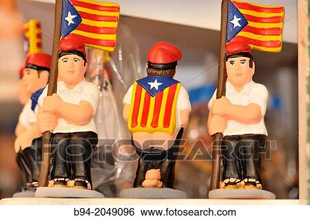 Caganers, typical Catalan figures, with indenpedentist flags, for Christmas decoration, Barcelona, Catalonia, Spain View Large Photo Image Stock Photograph - Caganers, typical Catalan figures, with indenpedentist flags, for Christmas decoration, Barcelona, Catalonia, Spain. Fotosearch