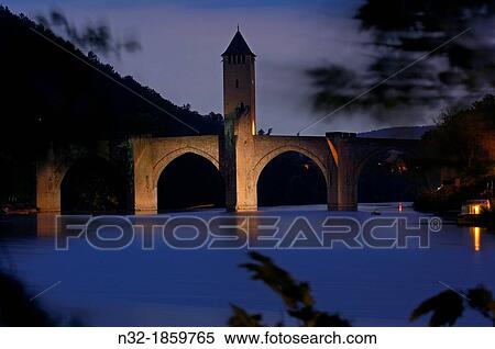 Cahors, Valentre bridge, Pont Valentre at Dusk, Lot River, Lot departament, Quercy, Via Podiensis, Way of St James, France View Large Photo Image Stock Photography - Cahors, Valentre bridge, Pont Valentre at Dusk, Lot River, Lot departament, Quercy, Via Podiensis, Way of St James, France. Fotosearch
