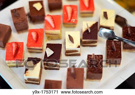 Cakes and desserts displayed in a buffet at the Metropole hotel in Vietnam View Large Photo Image Stock Image - Cakes and desserts displayed in a buffet at the Metropole hotel in Vietnam. Fotosearch