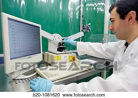 Stock Image - Calculating the thicknesses of the constituent layers of a multi-layer sample, ellipsometry, laminar flow cabinet, Synthesis Laboratory, CIC nanoGUNE Nanoscience Cooperative Research Center, Donostia, Gipuzkoa, Euskadi, Spain. Fotosearch