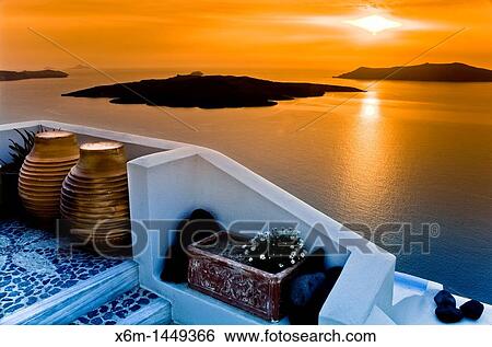 Caldera view from Fira village at sunset Santorini island, Cyclades islands, Aegean Sea, Greece, Europe View Large Photo Image Stock Photograph - Caldera view from Fira village at sunset Santorini island, Cyclades islands, Aegean Sea, Greece, Europe. Fotosearch
