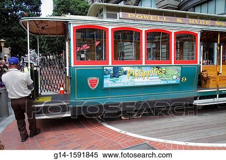 California, San Francisco, Powell Street, Hallidie Plaza, downtown street scene, transit system, historic cable car, icon, man-powered turntable, Black, man, job, rotate, pulling, View Large Photo Image Stock Photography - California, San Francisco, Powell Street, Hallidie Plaza, downtown street scene, transit system, historic cable car, icon, man-powered turntable, Black, man, job, rotate, pulling,. Fotosearch