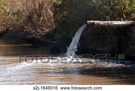 Calipatria, California - Water pouring from a pipe in the Sonny Bono Salton Sea National Wildlife Refuge View Large Photo Image Stock Photograph - Calipatria, California - Water pouring from a pipe in the Sonny Bono Salton Sea National Wildlife Refuge. Fotosearch