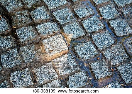 Stock Photo - calle o camino rustico de piedra tipo calzada romana. street or road stone rustic Roman road type. Fotosearch
