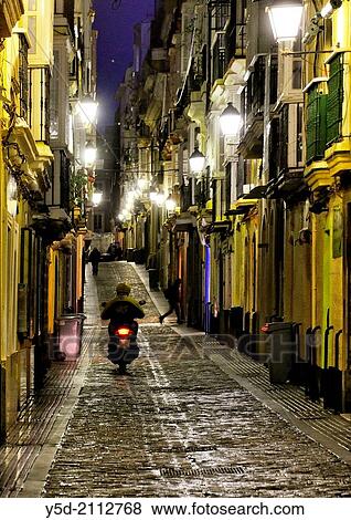 Calle San Francisco at night, old town of Cadiz, Andalusia, Spain, Europe. View Large Photo Image Stock Photo - Calle San Francisco at night, old town of Cadiz, Andalusia, Spain, Europe.. Fotosearch