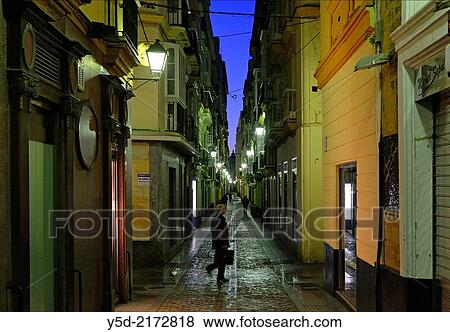 Stock Photo - Calle San Francisco by night, Cadiz, Andalusia, Spain.. Fotosearch