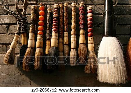 Calligraphy Brushes at Liulichang Market - The Liulichang is a famous district in Beijing that is known for its traditional Chinese architecture and also its antique market that sells various craftwork, artistry, calligraphy, inkstones and antiques. View Large Photo Image Stock Image - Calligraphy Brushes at Liulichang Market - The Liulichang is a famous district in Beijing that is known for its traditional Chinese architecture and also its antique market that sells various craftwork, artistry, calligraphy, inkstones and antiques.. Fotosearch