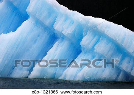 Calved iceberg from the Le Conte Glacier just outside Petersburg, southeast Alaska, USA Le Conte Glacier is the southernmost tidewater glacier in North America View Large Photo Image Stock Photograph - Calved iceberg from the Le Conte Glacier just outside Petersburg, southeast Alaska, USA Le Conte Glacier is the southernmost tidewater glacier in North America. Fotosearch