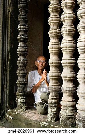 CAMBODIA, ANGKOR, ANGKOR WAT, GALLERY, OLD MAN IN WINDOW. View Large Photo Image Stock Image - CAMBODIA, ANGKOR, ANGKOR WAT, GALLERY, OLD MAN IN WINDOW.. Fotosearch