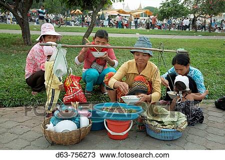 Cambodia Crowds relaxing on a Sunday in Phnom Penh Food seller View Large Photo Image Stock Image - Cambodia Crowds relaxing on a Sunday in Phnom Penh Food seller. Fotosearch