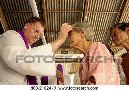 CAMBODIA. Mass by American Catholic priest for Vietnamese Catholics living in Cambodia. View Large Photo Image Stock Image - CAMBODIA. Mass by American Catholic priest for Vietnamese Catholics living in Cambodia.. Fotosearch