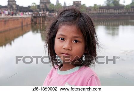 Cambodia, Siem Reap, Angkor Wat, Young girl View Large Photo Image Stock Image - Cambodia, Siem Reap, Angkor Wat, Young girl. Fotosearch
