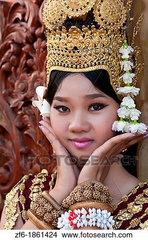 Cambodia, Siem Reap, Portrait of dancer wearing traditional gold headdress View Large Photo Image Picture - Cambodia, Siem Reap, Portrait of dancer wearing traditional gold headdress. Fotosearch