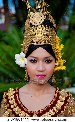 Cambodia, Siem Reap, Portrait of dancer wearing traditional gold headdress View Large Photo Image Stock Image - Cambodia, Siem Reap, Portrait of dancer wearing traditional gold headdress. Fotosearch