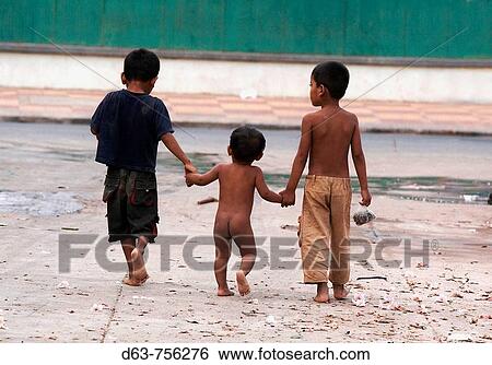 Cambodia Three boys walking Phnom Penh View Large Photo Image Stock Photograph - Cambodia Three boys walking Phnom Penh. Fotosearch