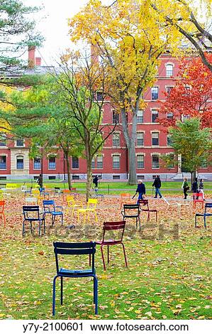 Stock Image - CAMBRIDGE, MA, USA: Harvard Yard, old heart of Harvard University campus, after Fall rains in Cambridge. Fotosearch