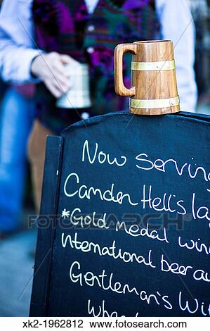 Camden hell's? now serving? sign and an old beer mug, Deptford, London View Large Photo Image Stock Image - Camden hell's? now serving? sign and an old beer mug, Deptford, London. Fotosearch