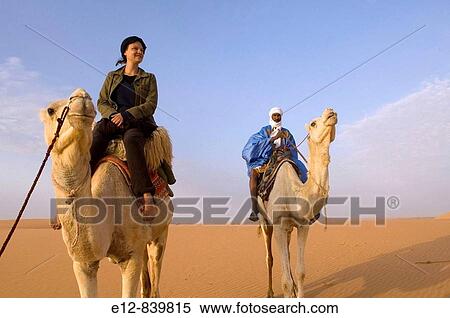 Camel riding, Chinguetti. Adrar Plateau, Sahara Desert, Mauritania View Large Photo Image Stock Photography - Camel riding, Chinguetti. Adrar Plateau, Sahara Desert, Mauritania. Fotosearch