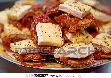Camembert cheese,? pintxos? at Bar Txondorra in ol town, Donostia (San Sebastian), Gipuzkoa, Basque Country, Spain View Large Photo Image Stock Photo - Camembert cheese,? pintxos? at Bar Txondorra in ol town, Donostia (San Sebastian), Gipuzkoa, Basque Country, Spain. Fotosearch
