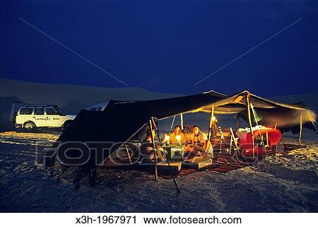 Stock Image - camp in the Larreguett dunes around Nefta, Tunisia, North Africa.. Fotosearch