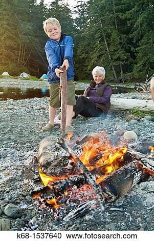 campers by a camp fire on Nootka Island, BC, Canada View Large Photo Image Stock Image - campers by a camp fire on Nootka Island, BC, Canada. Fotosearch