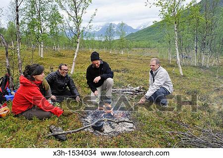 Picture - campfire, Nordmannvikdalen valley, region of Lyngen, County of Troms, Norway, Northern Europe. Fotosearch