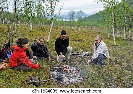 campfire, Nordmannvikdalen valley, region of Lyngen, County of Troms, Norway, Northern Europe View Large Photo Image Stock Photography - campfire, Nordmannvikdalen valley, region of Lyngen, County of Troms, Norway, Northern Europe. Fotosearch