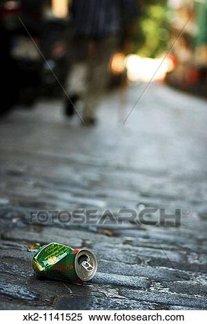 Stock Photography - Can on the ground. Fotosearch