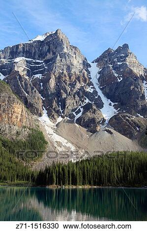 Stock Image - Canada, Alberta, Banff National Park, Moraine Lake, Rocky Mountains.. Fotosearch