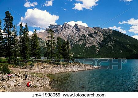 Stock Photo - CANADA, ALBERTA, ROCKY MOUNTAINS, BANFF NATIONAL PARK, LAKE MINNEWANKA.. Fotosearch