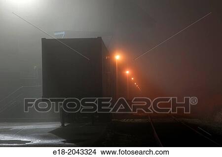 Canada, BC, Delta. Truck depot on foggy night. View Large Photo Image Picture - Canada, BC, Delta. Truck depot on foggy night.. Fotosearch