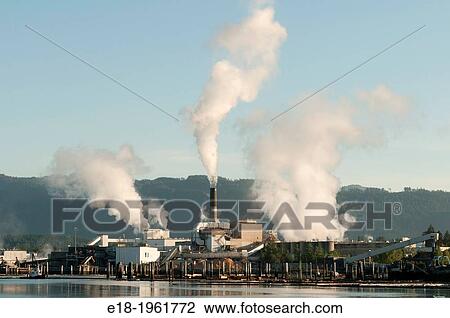 Stock Image - Canada, BC, Vancouver Island, Port Alberni. Pulp Mill on the shore of the Alberni Inlet.. Fotosearch