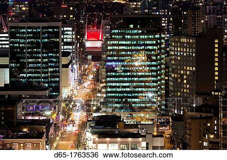 Canada, British Columbia, Vancouver, elevated view West End buildings along Robson Street, dusk View Large Photo Image Stock Photograph - Canada, British Columbia, Vancouver, elevated view West End buildings along Robson Street, dusk. Fotosearch
