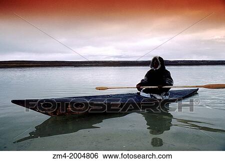 CANADA, NWT, HUDSON BAY, SOUTH HAMPTON ISLAND, NATIVE PT, INUIT IN TRADITIONAL KAYAK. View Large Photo Image Stock Photograph - CANADA, NWT, HUDSON BAY, SOUTH HAMPTON ISLAND, NATIVE PT, INUIT IN TRADITIONAL KAYAK.. Fotosearch