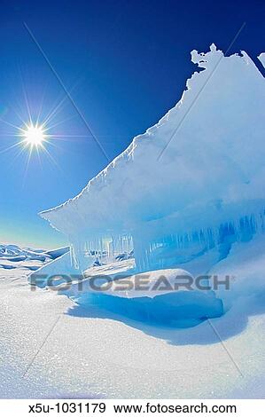 Canadian High Arctic, Lancaster Sound, Nunavut Canada May 2004 Arctic landscape with midnight sun in sky, blue ice View Large Photo Image Stock Photo - Canadian High Arctic, Lancaster Sound, Nunavut Canada May 2004 Arctic landscape with midnight sun in sky, blue ice. Fotosearch