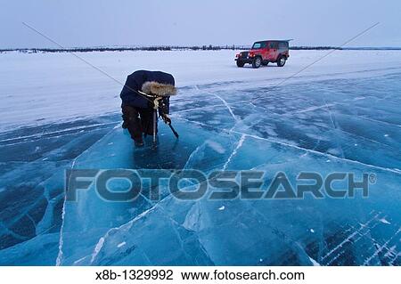 Canadian photographer Gilles Pucheu at work near his home in Yellowknife, Northwest Territories, Canada View Large Photo Image Stock Image - Canadian photographer Gilles Pucheu at work near his home in Yellowknife, Northwest Territories, Canada. Fotosearch
